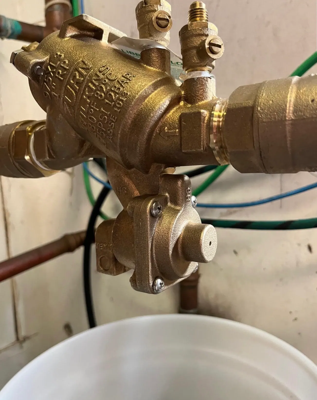 Close-up detail of a backflow preventer assembly
